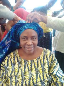 Empowerment Pictures - tying of gele at Christ Orphange Home